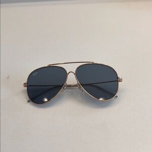 Ray-Ban Aviator Sunglasses with Rose Gold Frame and Dark Lenses
